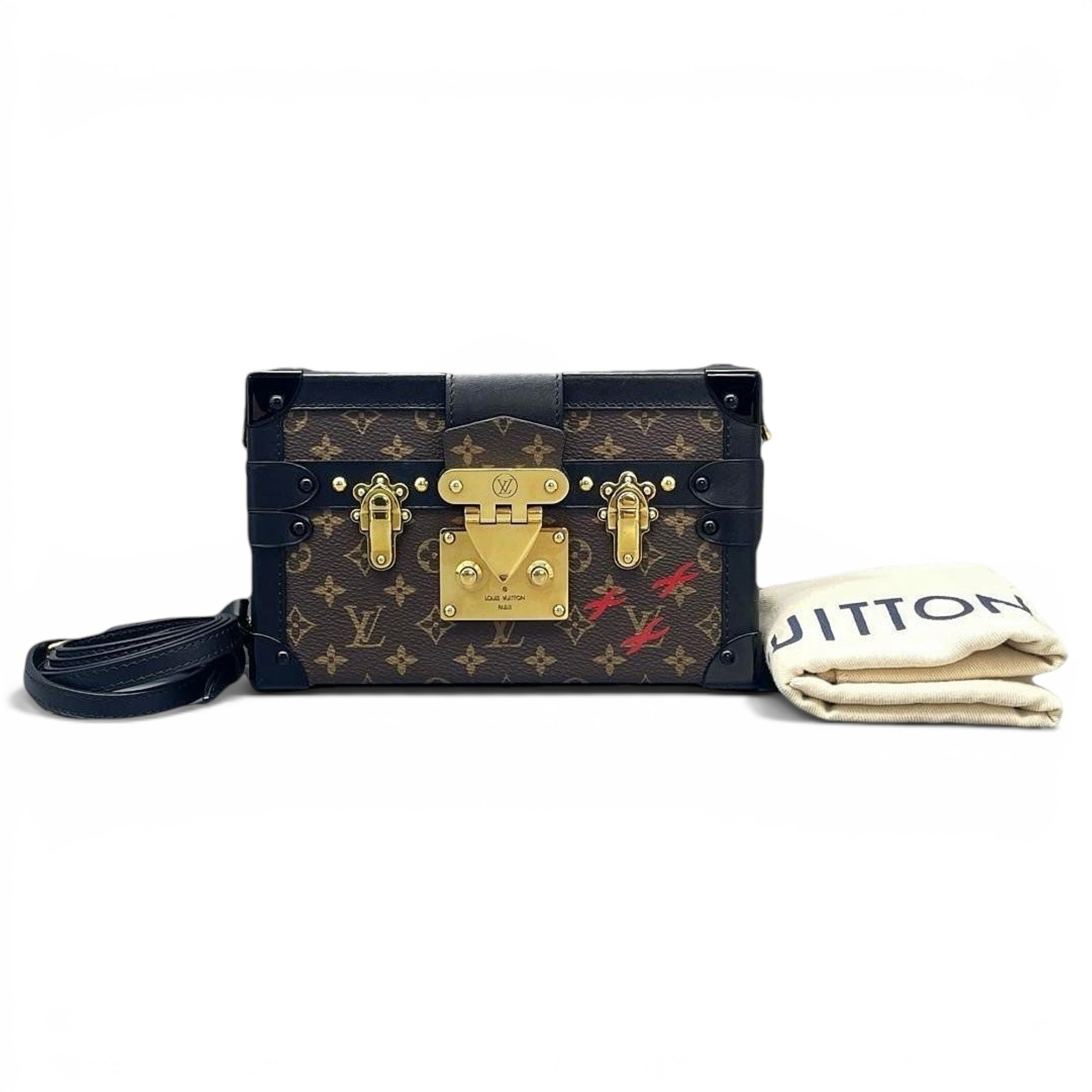 Pochette Trunk leather handbag