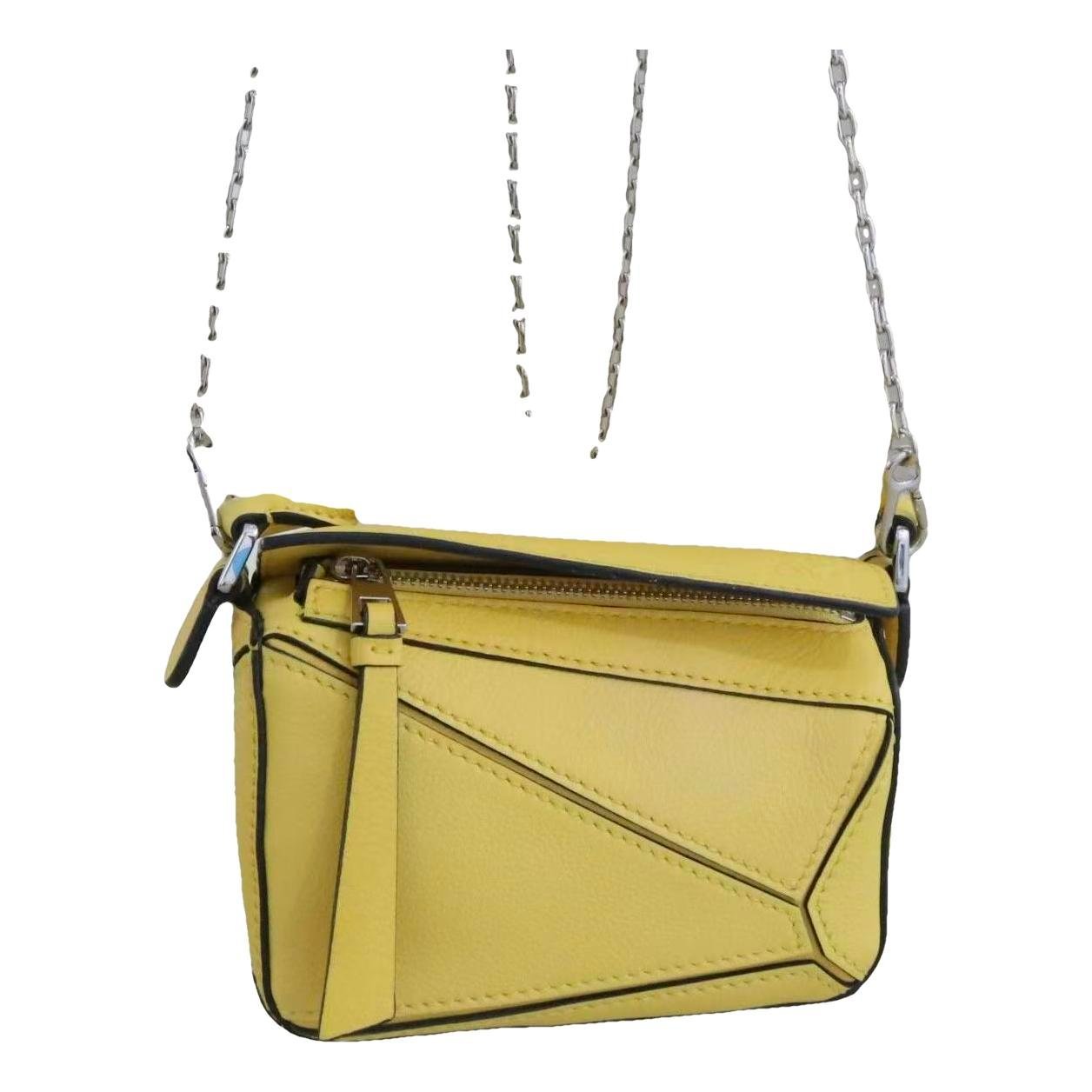 Puzzle leather handbag