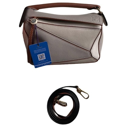 Puzzle leather handbag