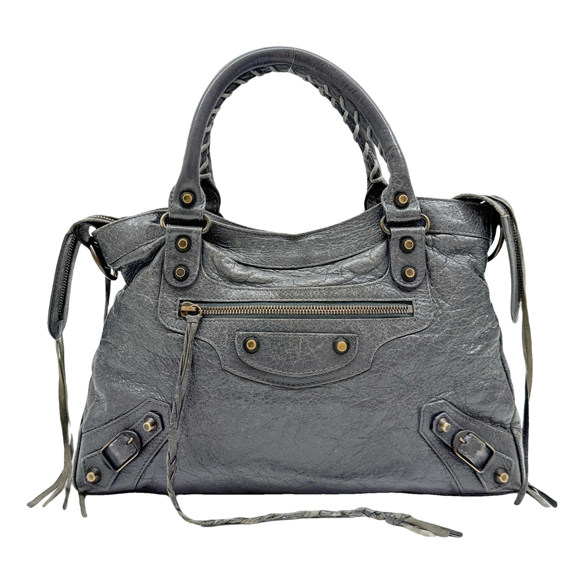 First leather handbag