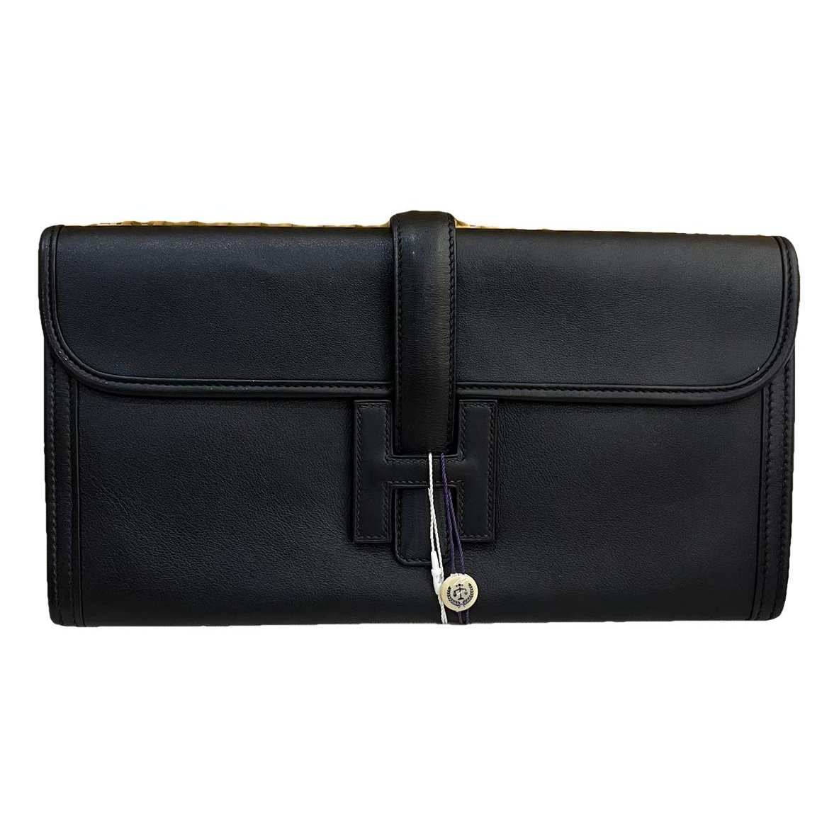Jige leather clutch bag