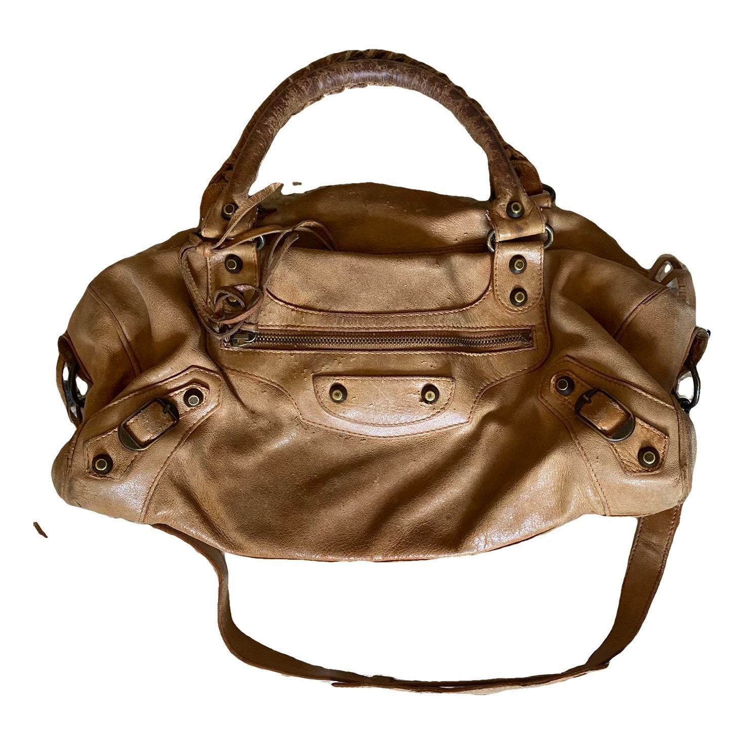 First leather handbag