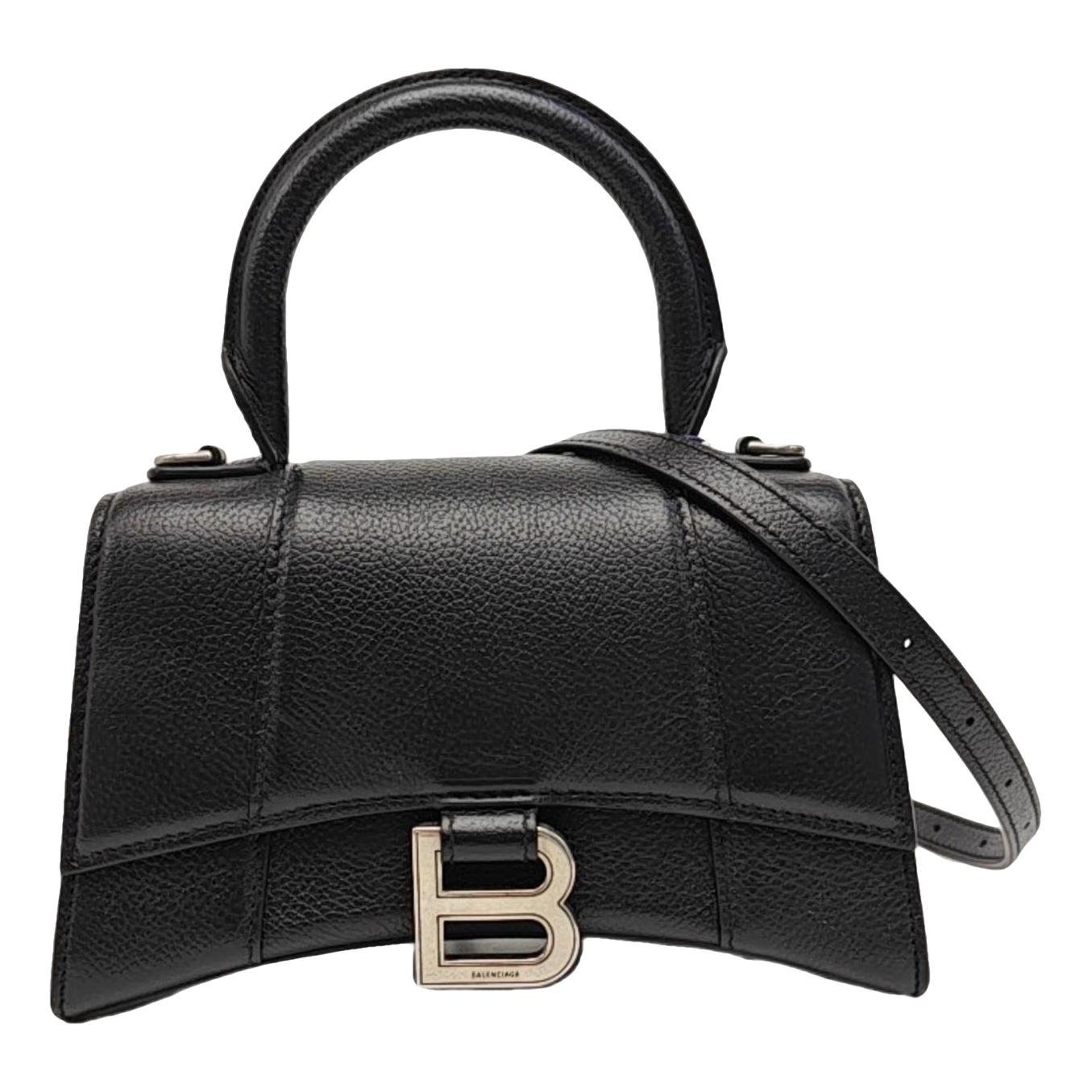 Hourglass leather handbag