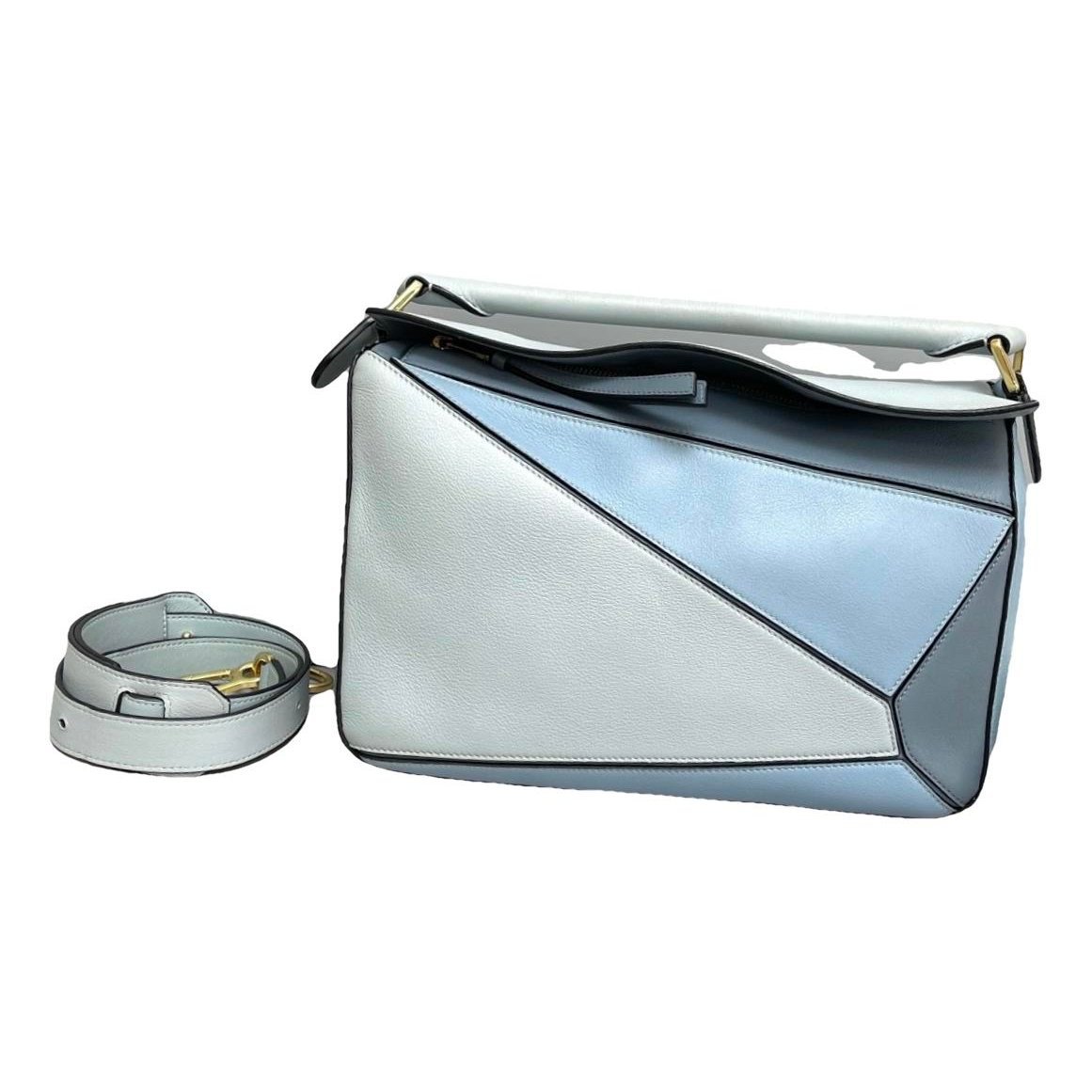 Puzzle leather handbag