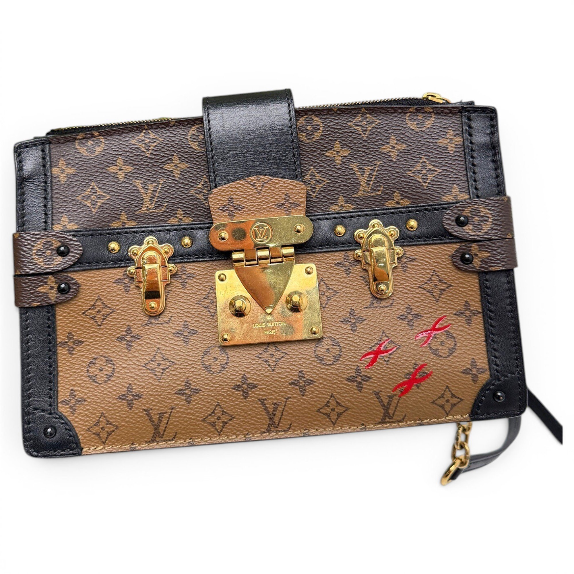 Pochette Trunk leather handbag