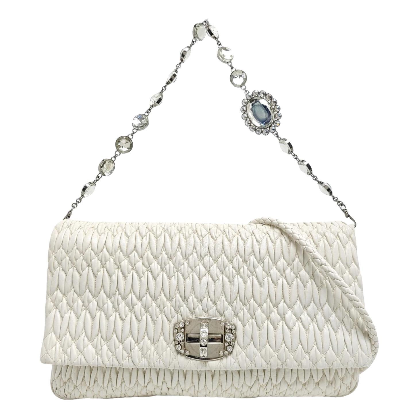 Miu Crystal leather handbag