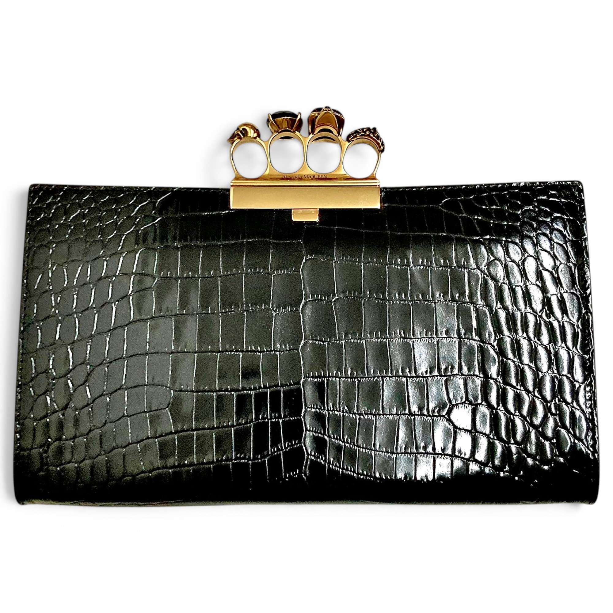 Knuckle leather clutch bag