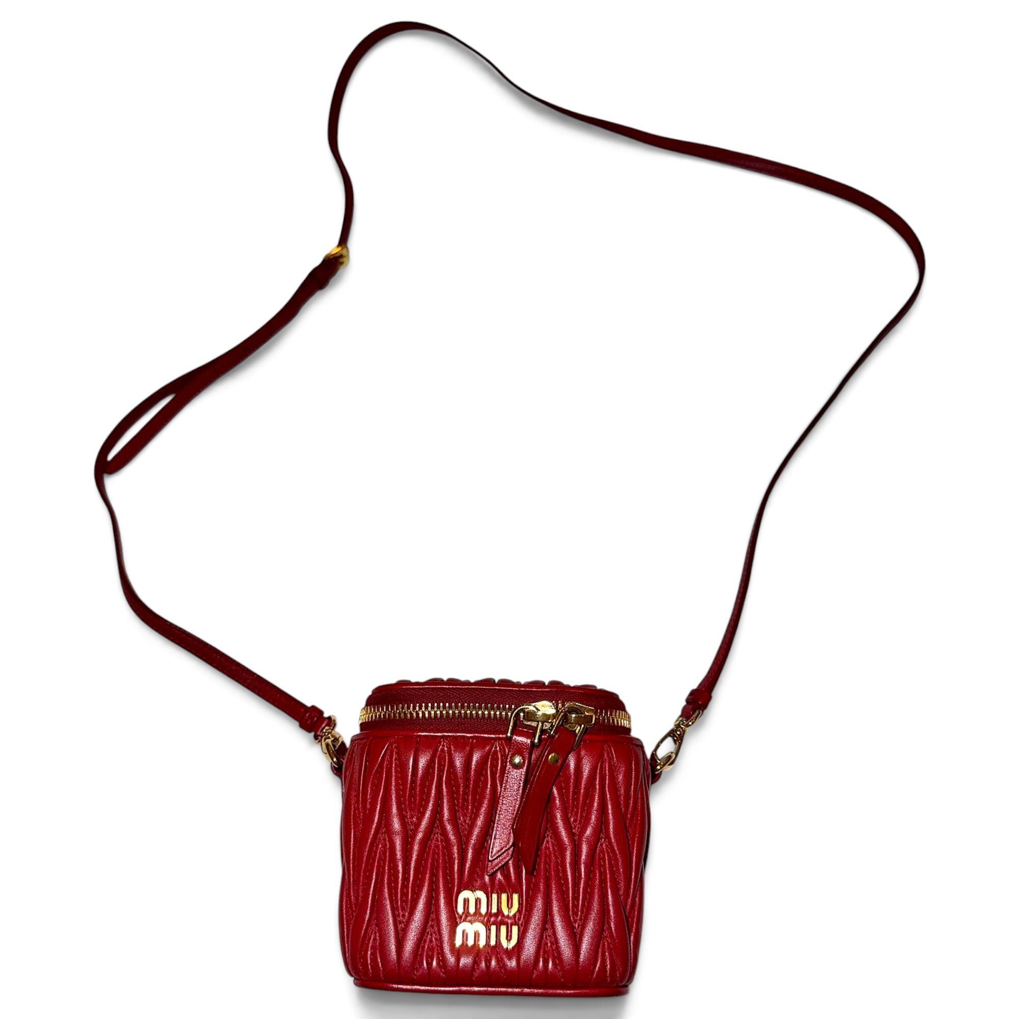 Matelassé leather clutch bag
