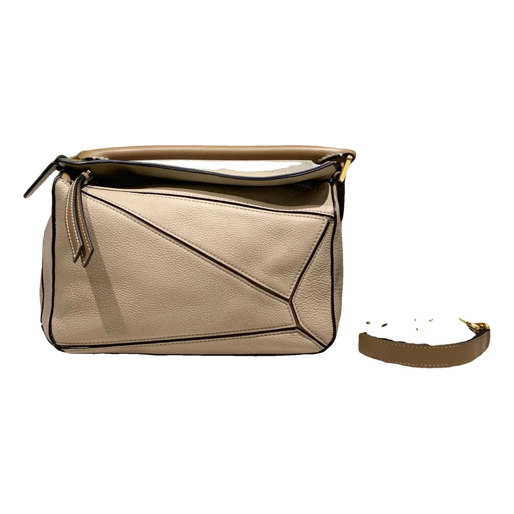 Puzzle leather crossbody bag