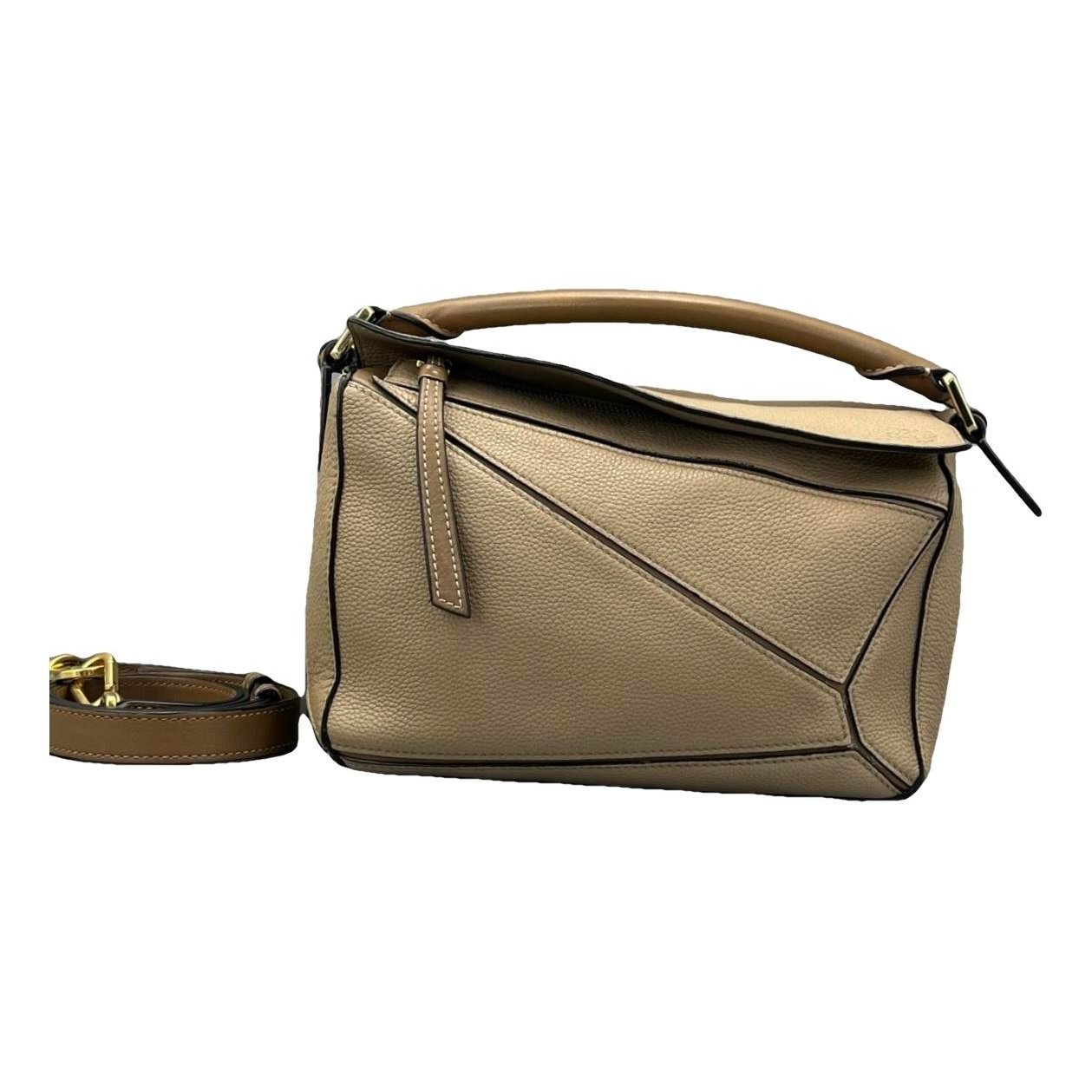 Puzzle leather handbag