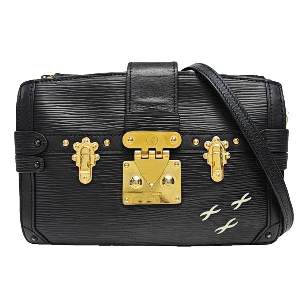 Pochette Trunk leather crossbody bag