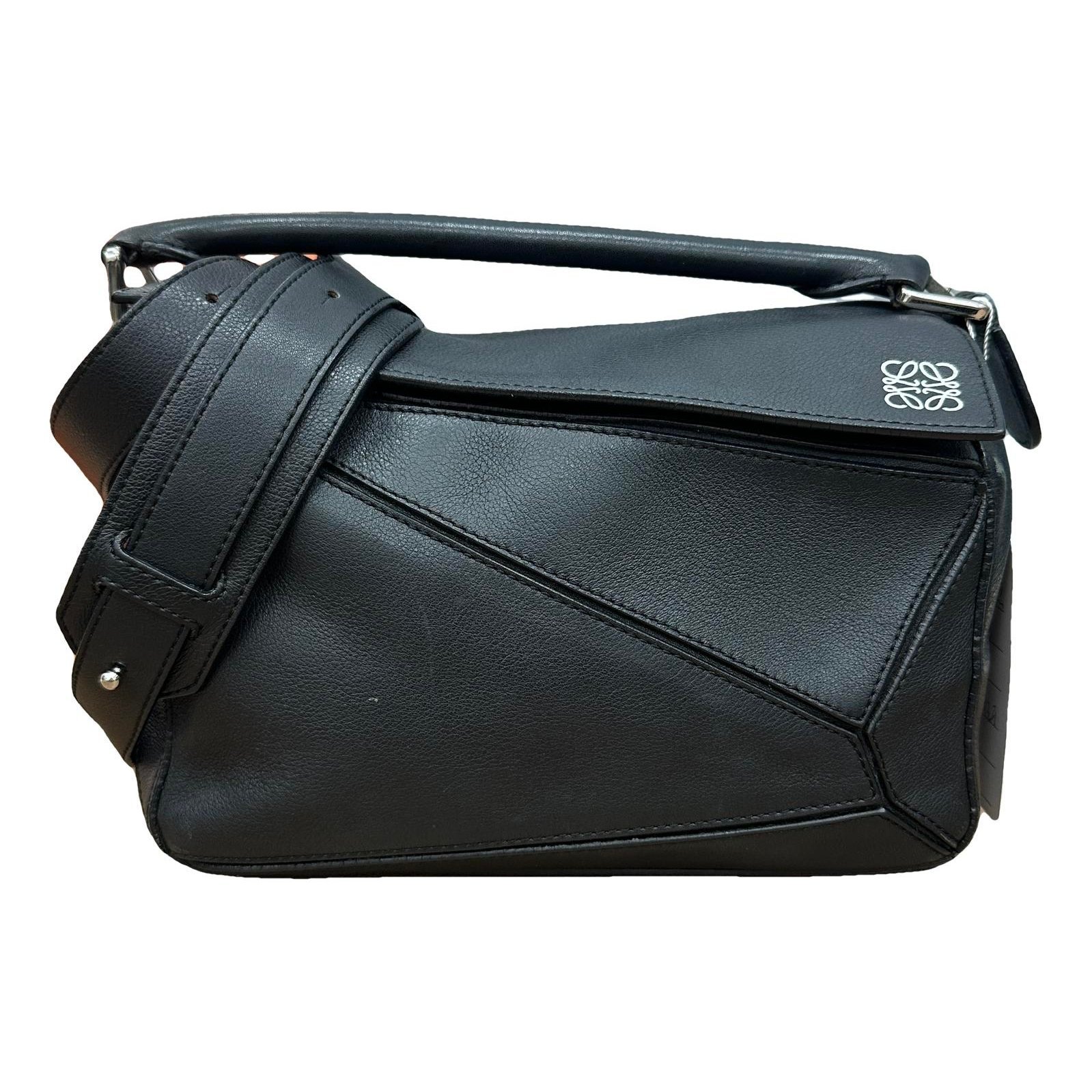 Puzzle leather handbag