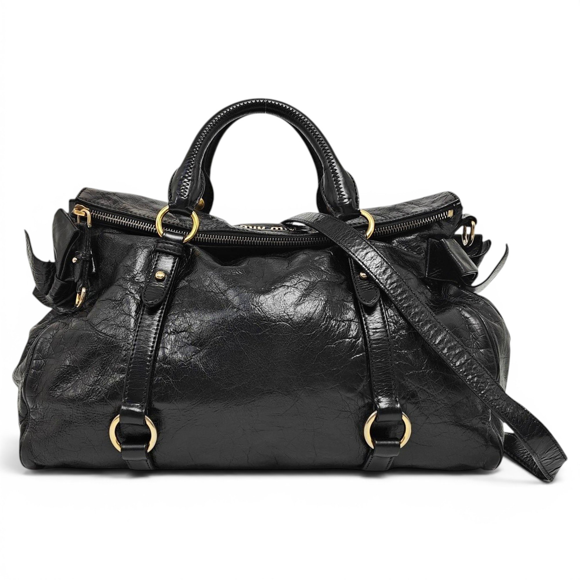 Bow bag leather handbag