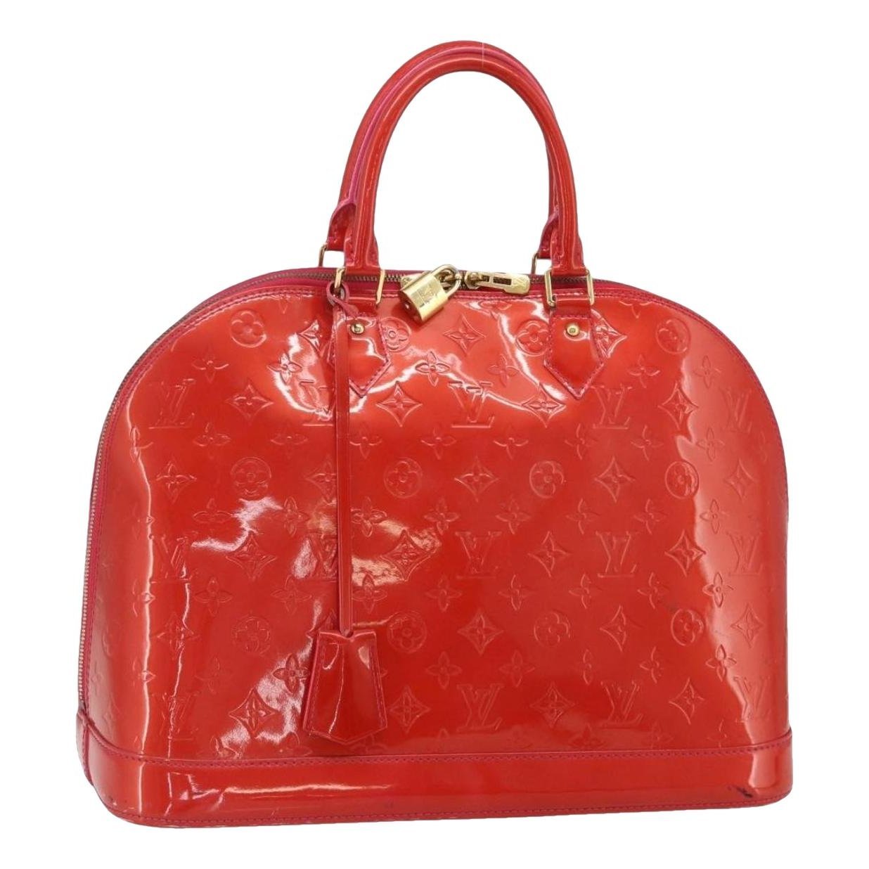 Alma patent leather handbag