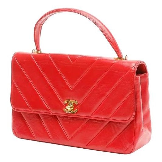 Trendy CC Top Handle leather handbag