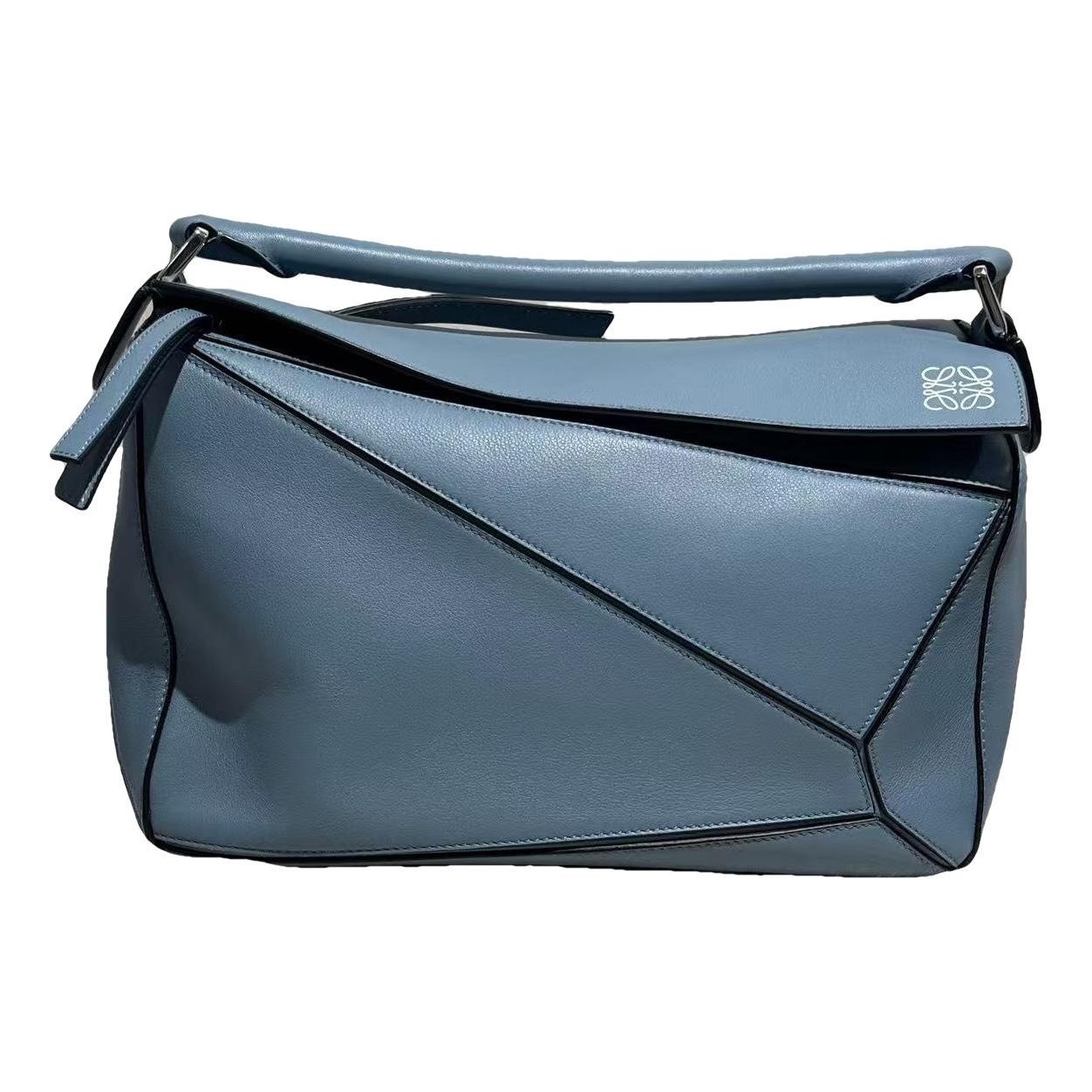 Puzzle leather handbag