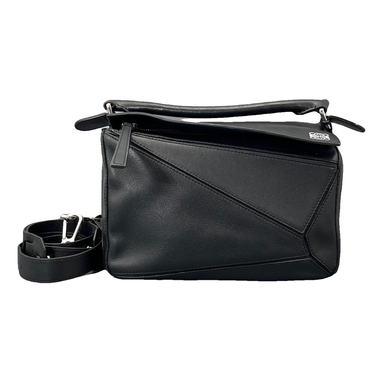 Puzzle leather handbag
