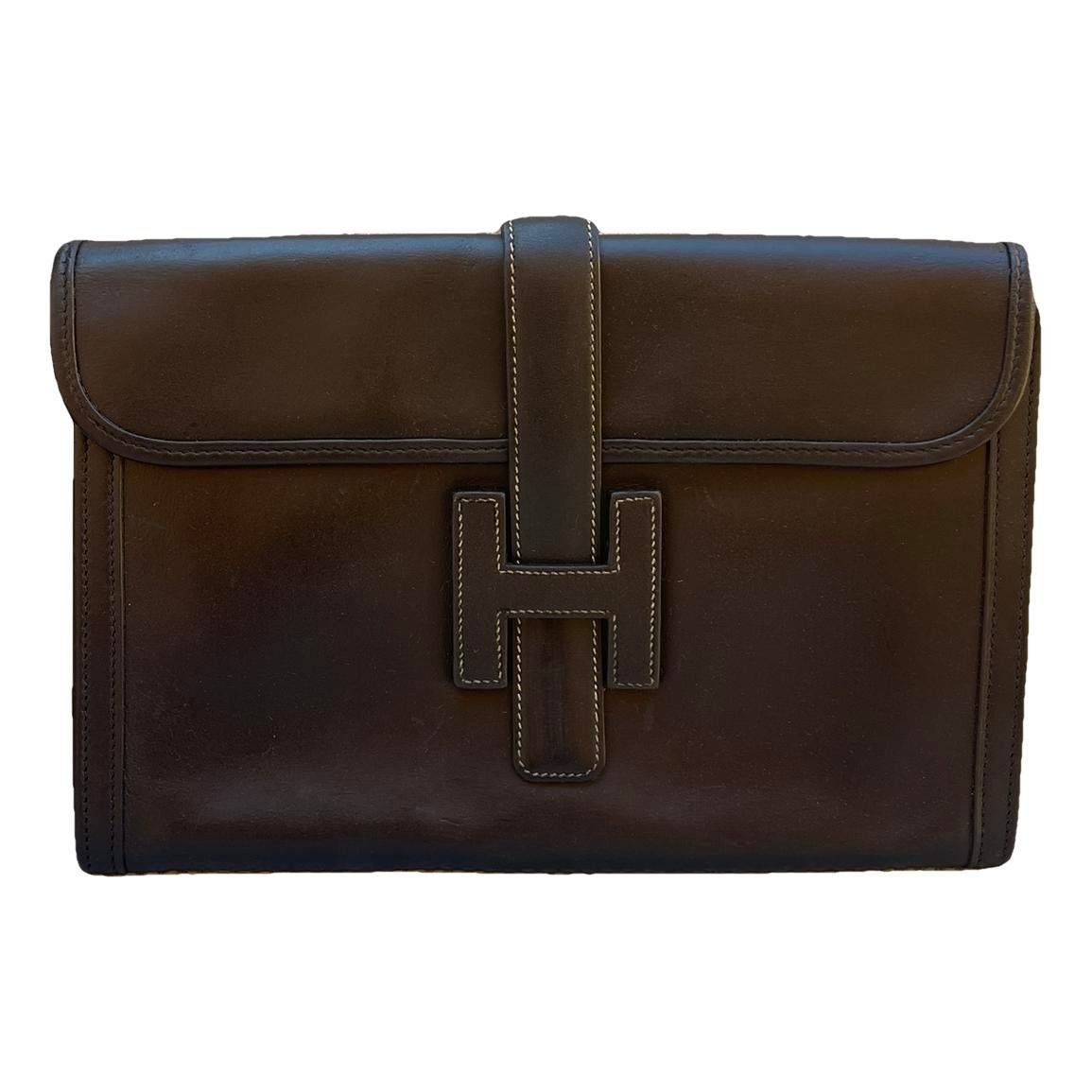 Jige leather clutch bag