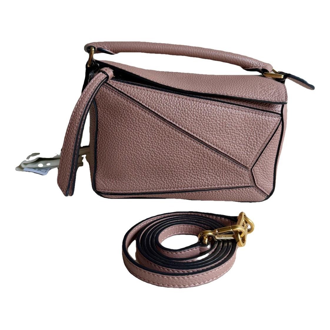 Puzzle leather handbag