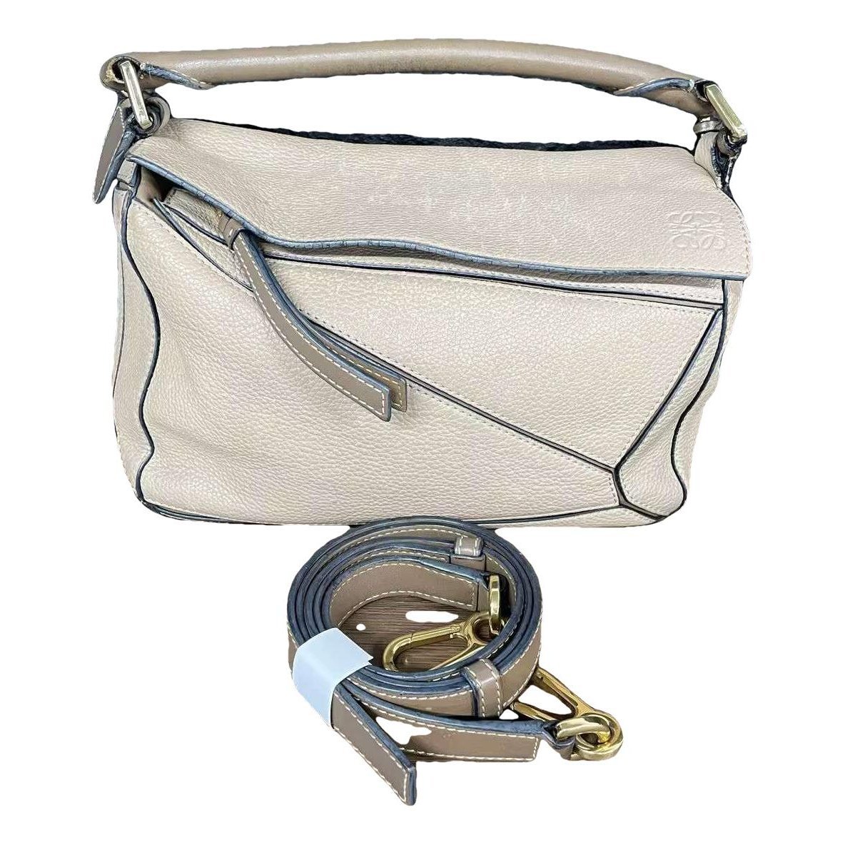 Puzzle leather handbag