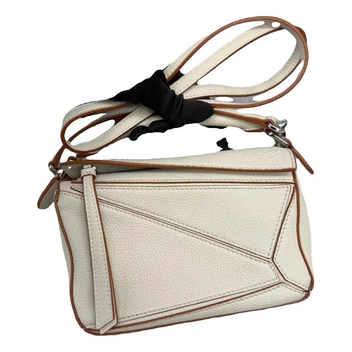 Puzzle leather handbag