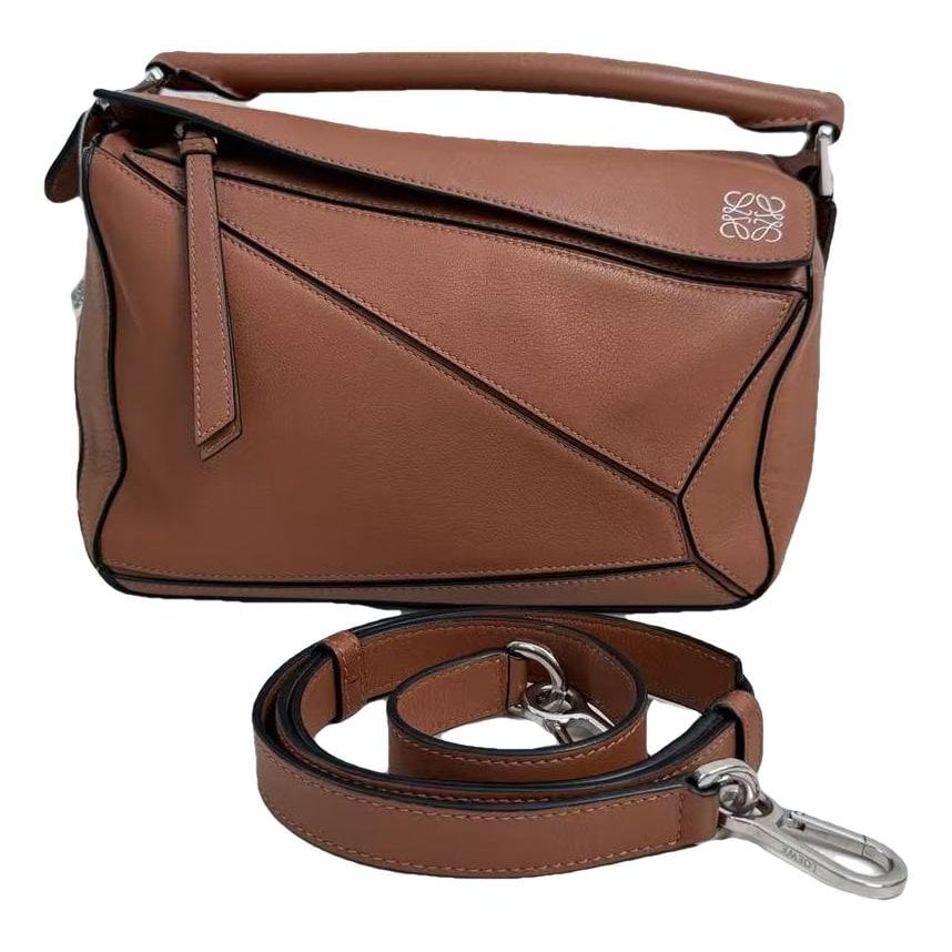 Puzzle leather handbag