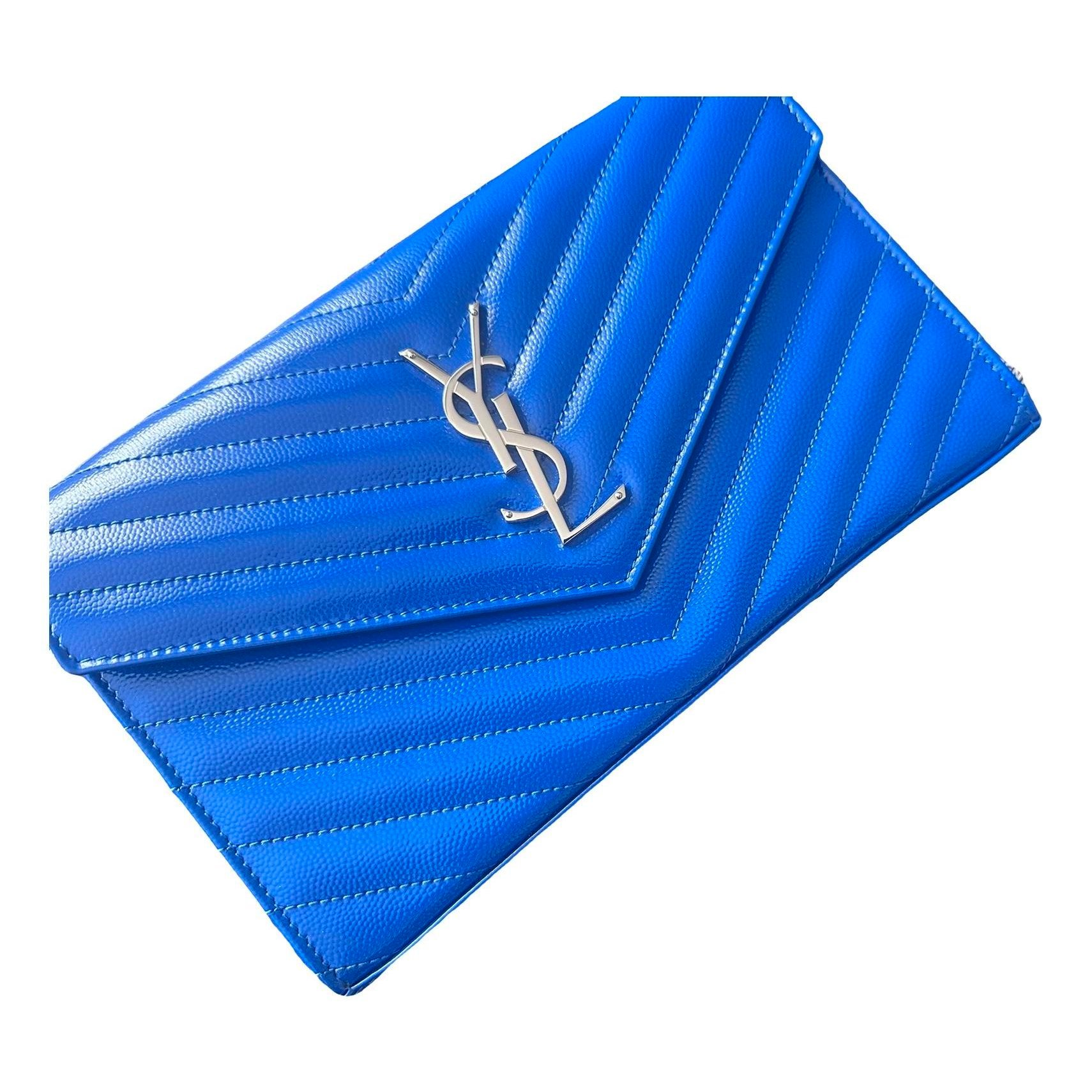 Cassandre patent leather clutch bag