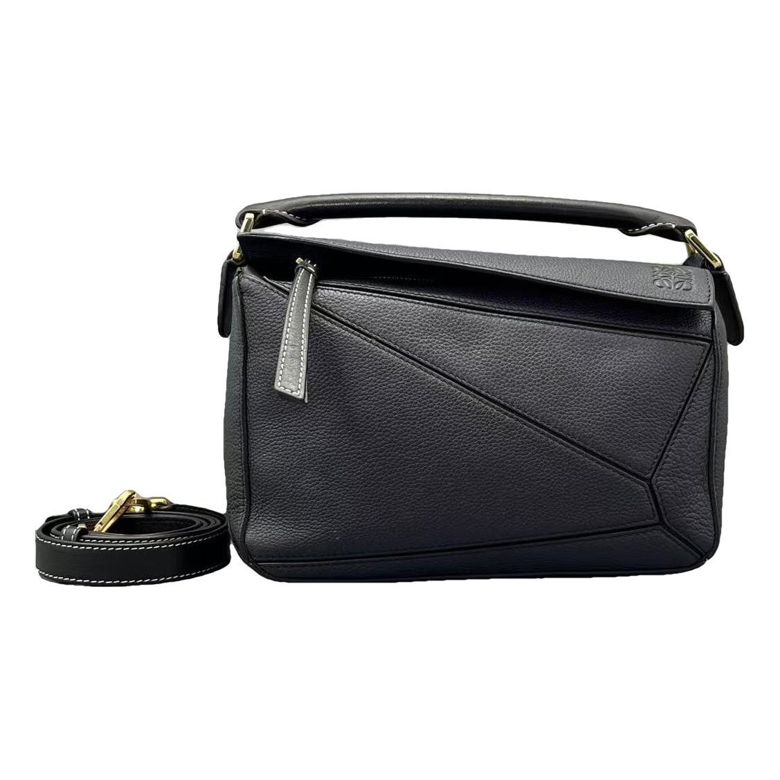 Puzzle leather handbag