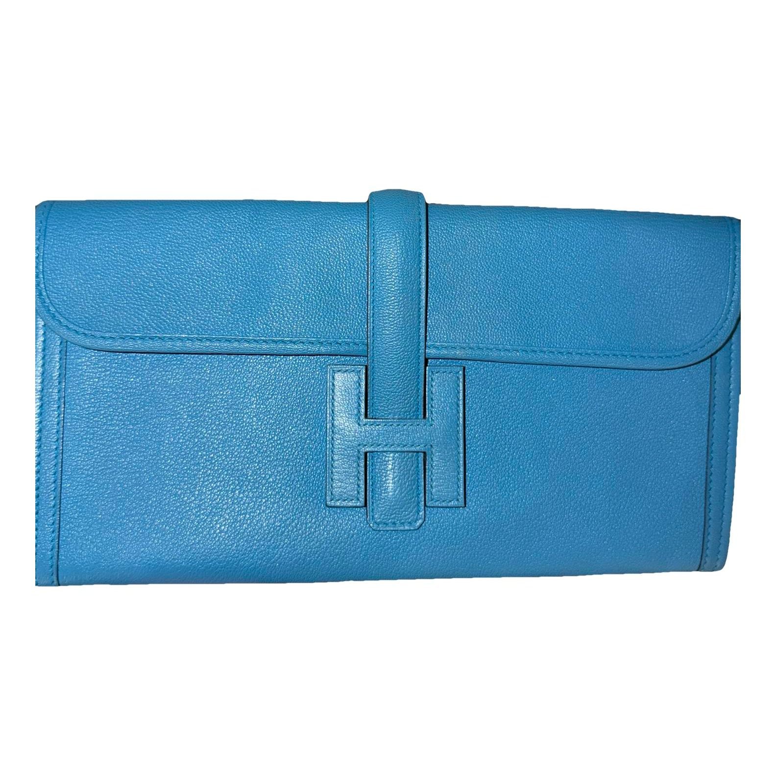 Jige leather clutch bag