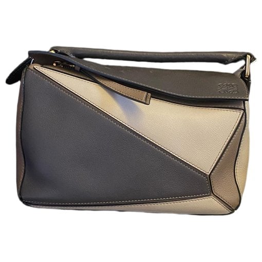 Puzzle leather handbag
