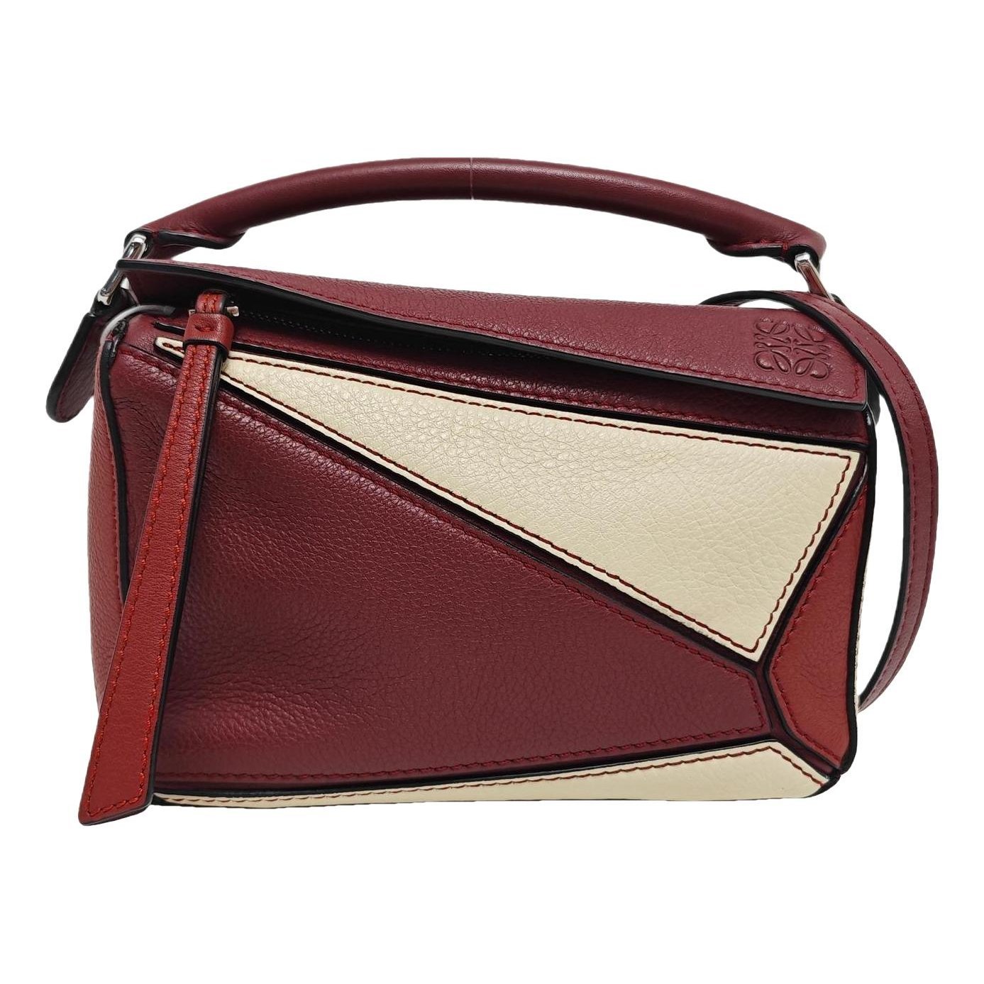 Puzzle leather handbag