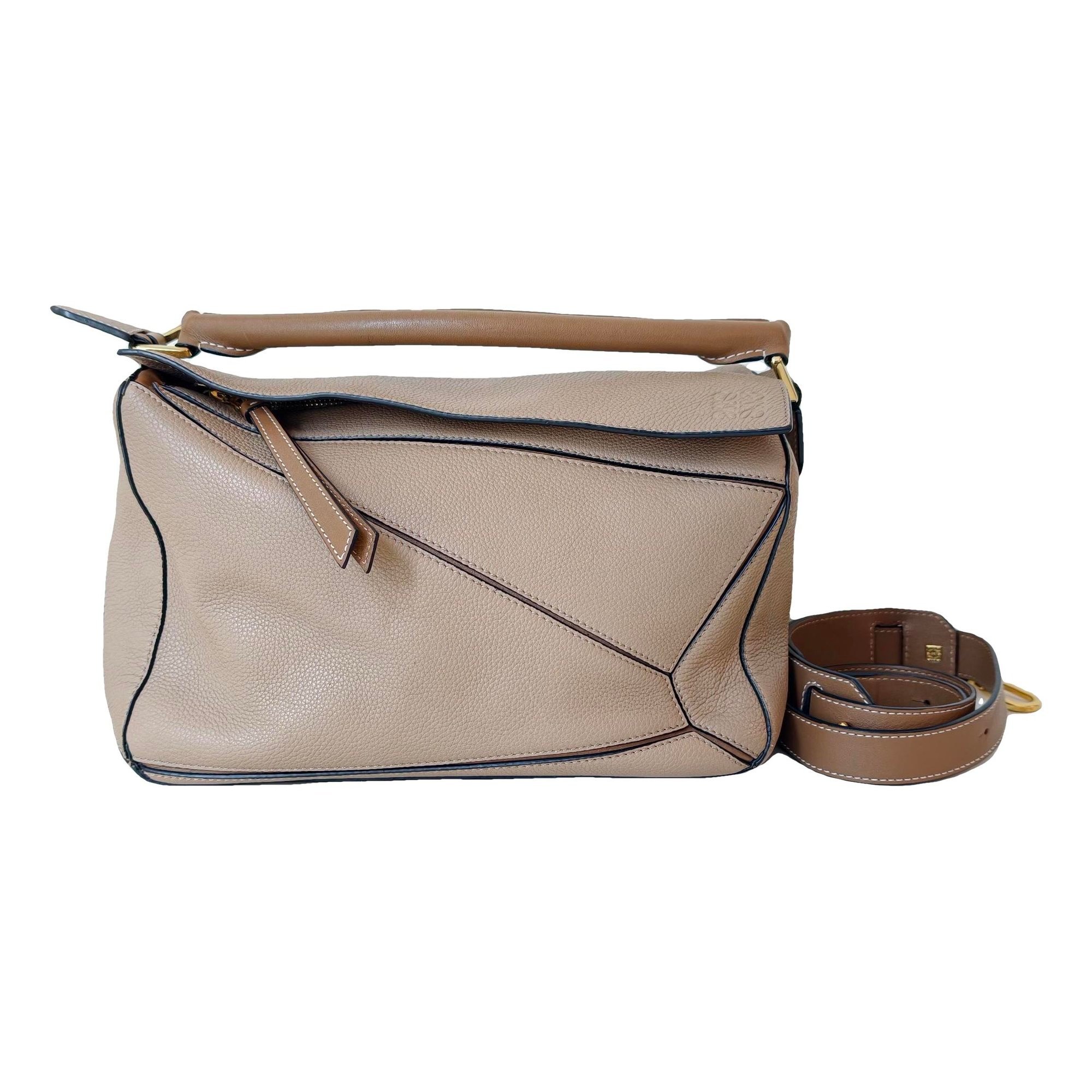 Puzzle leather handbag