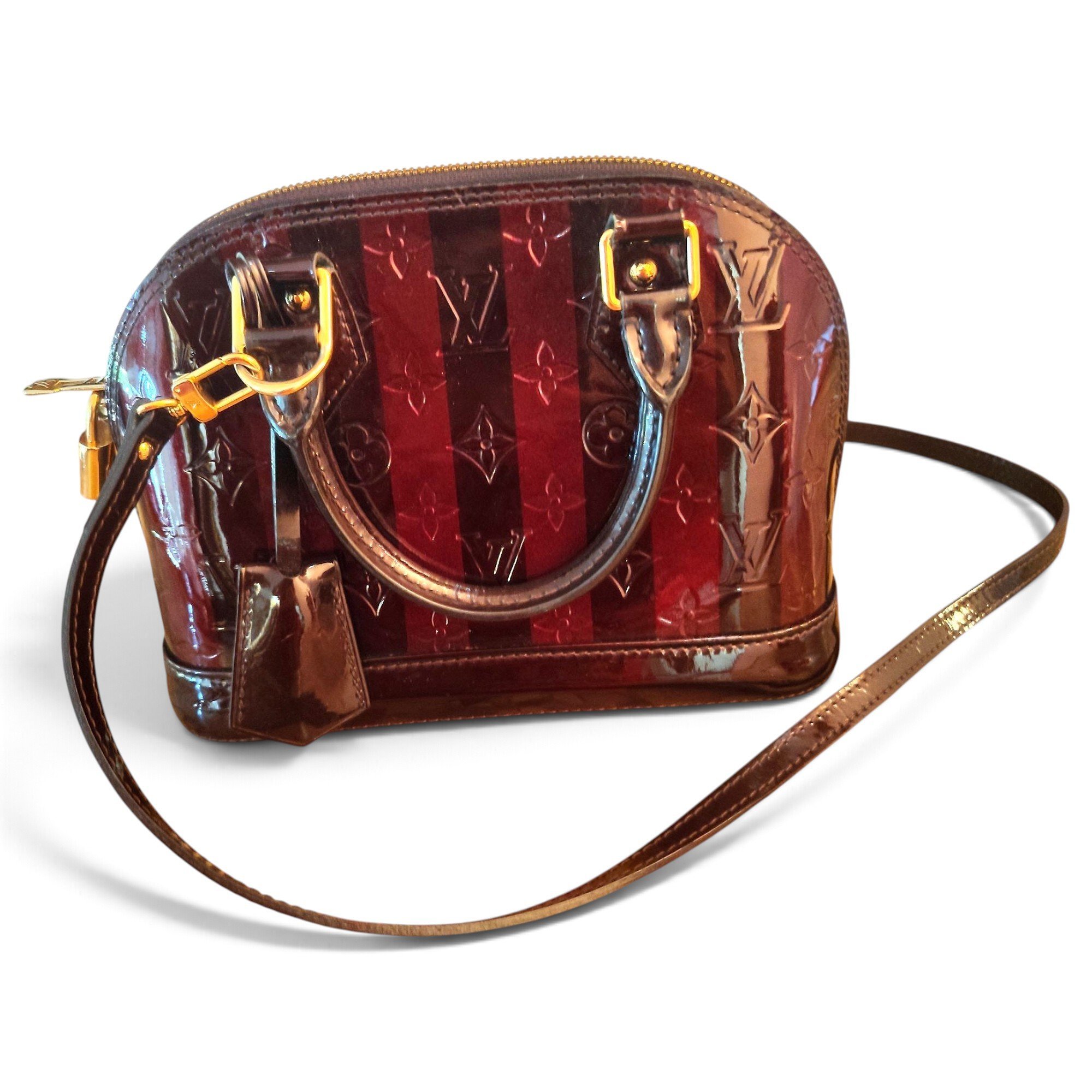 Louis Vuitton Alma patent leather handbag