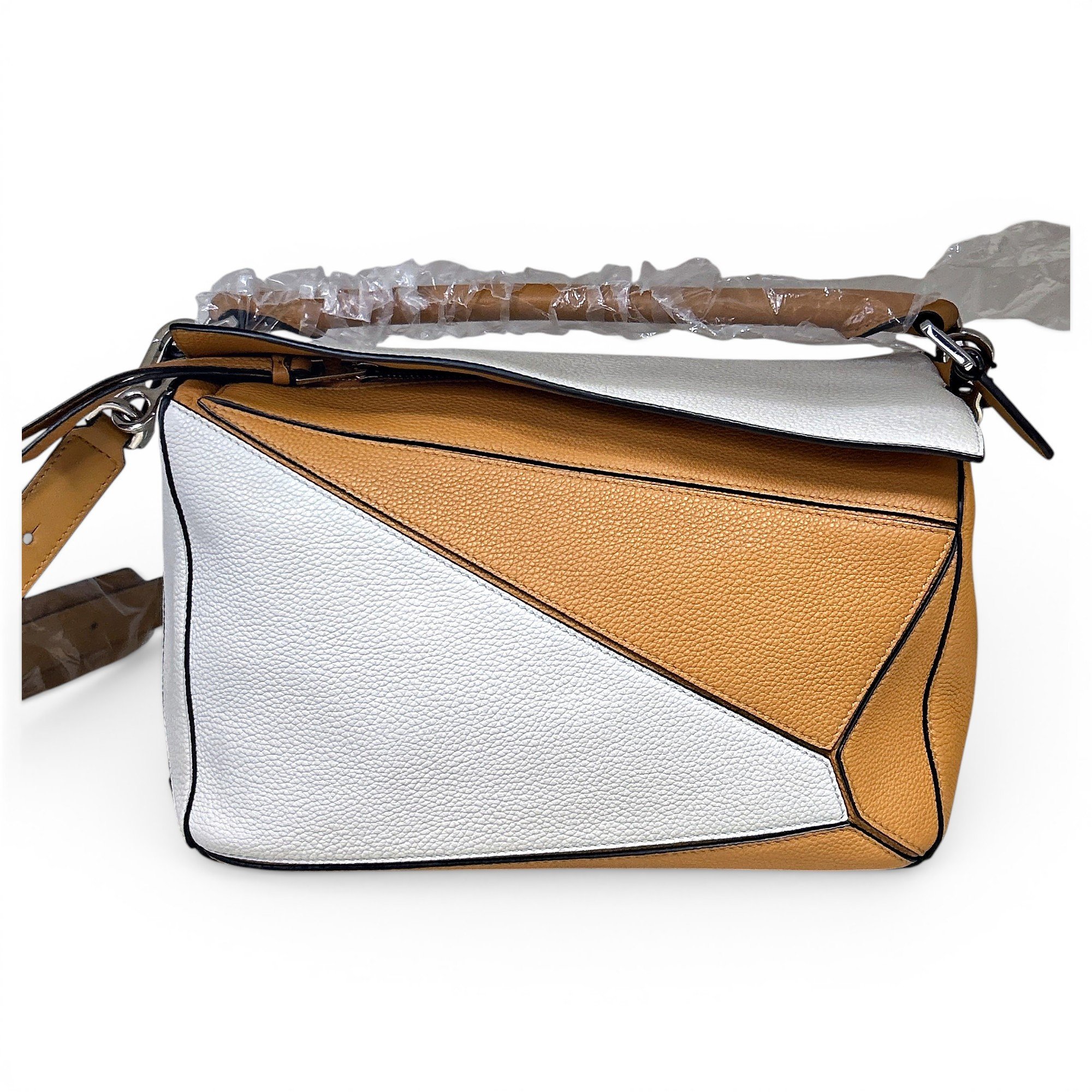 Puzzle leather handbag