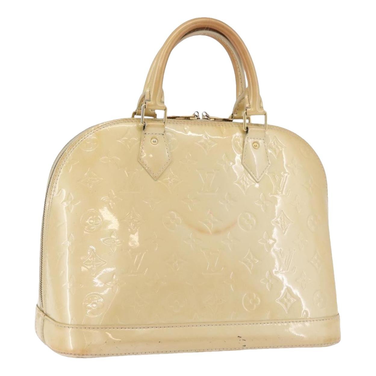 Alma patent leather handbag