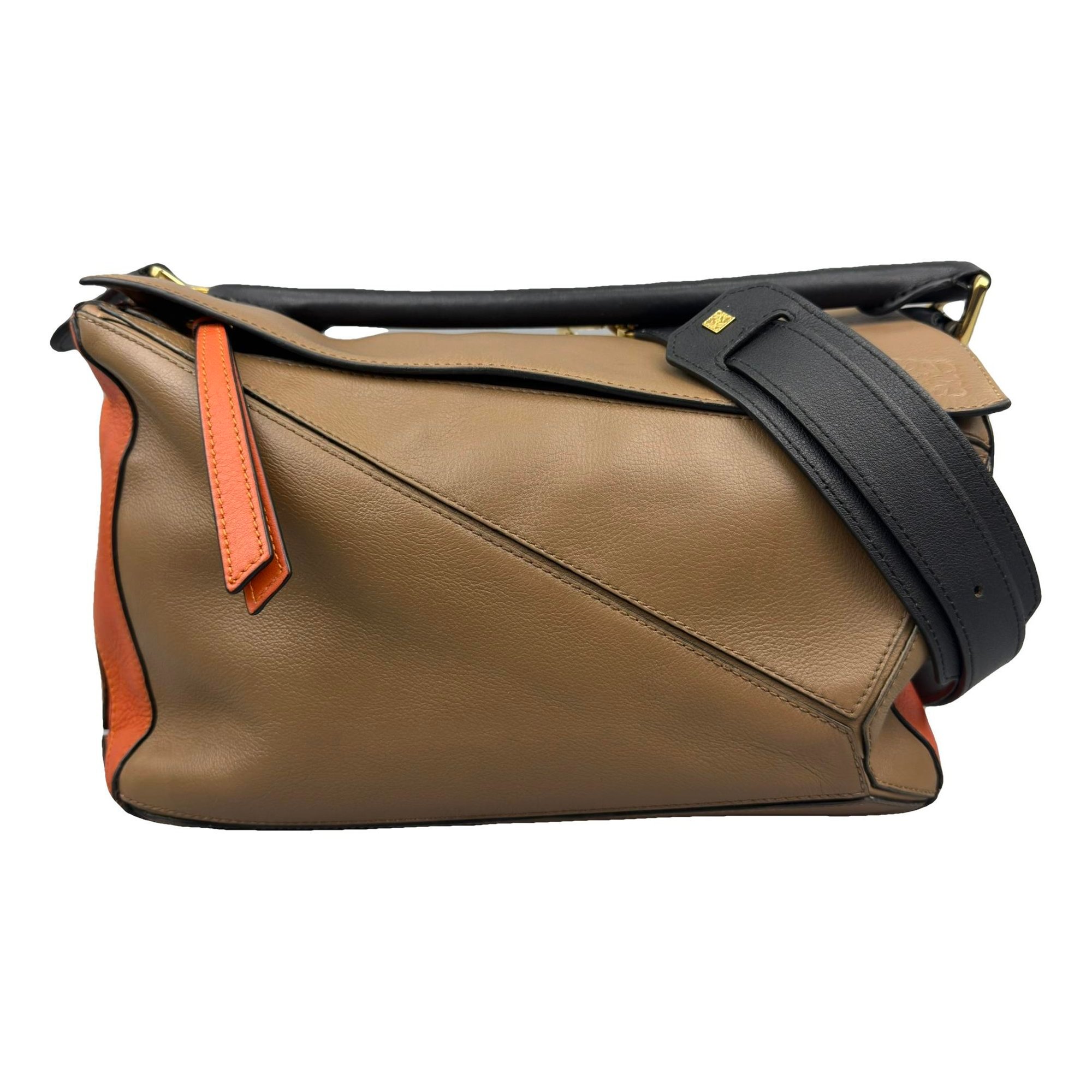 Puzzle leather handbag