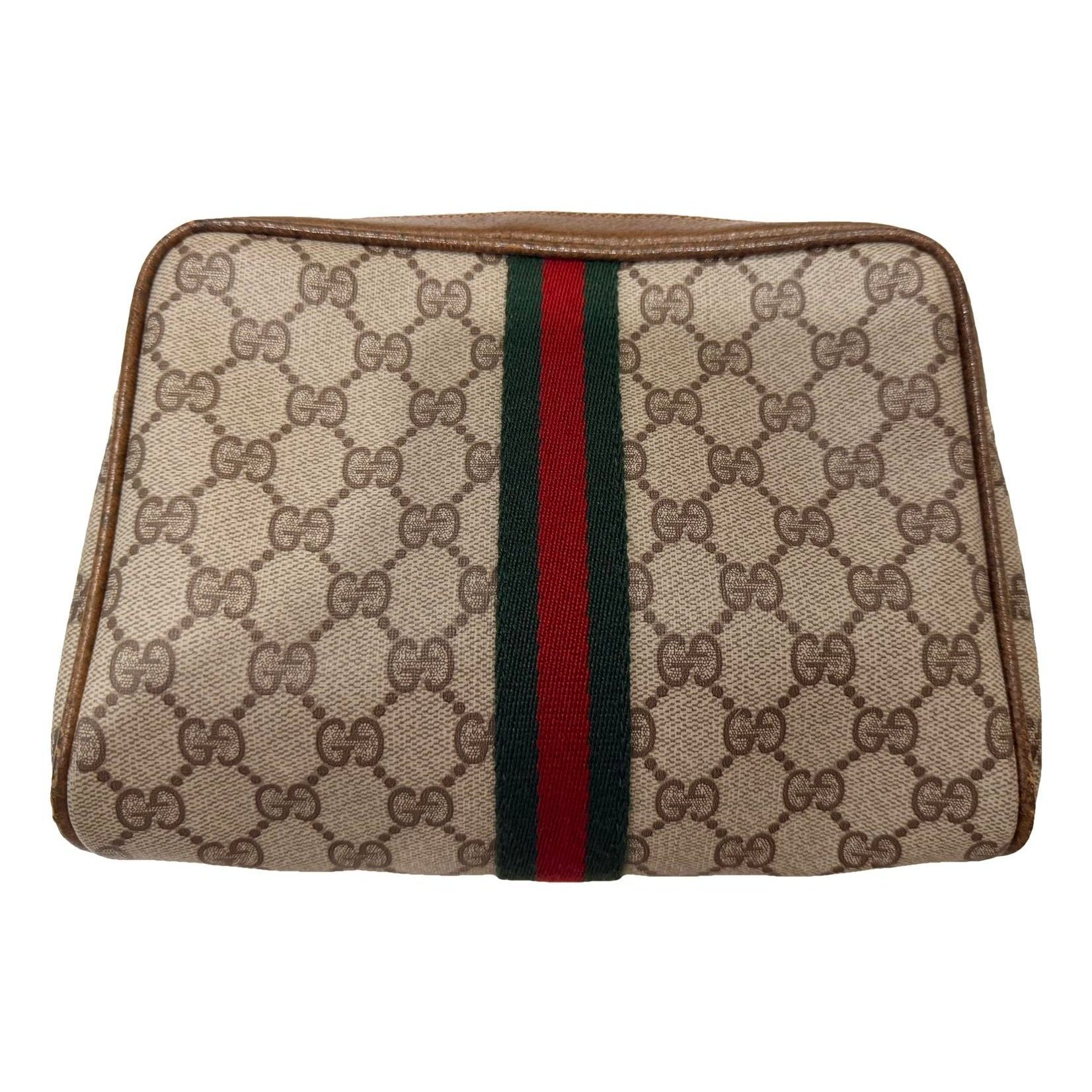 Ophidia vinyl clutch bag