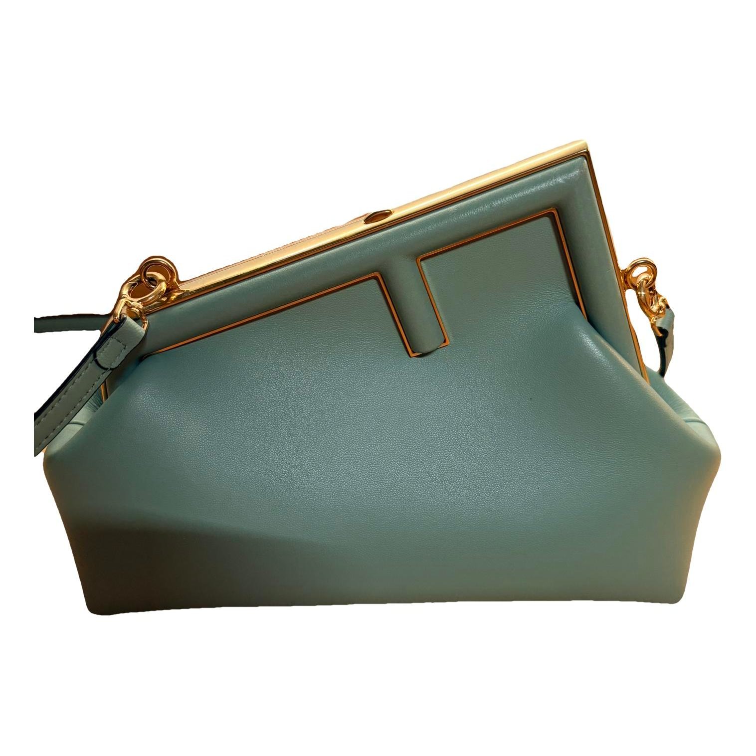 First leather handbag