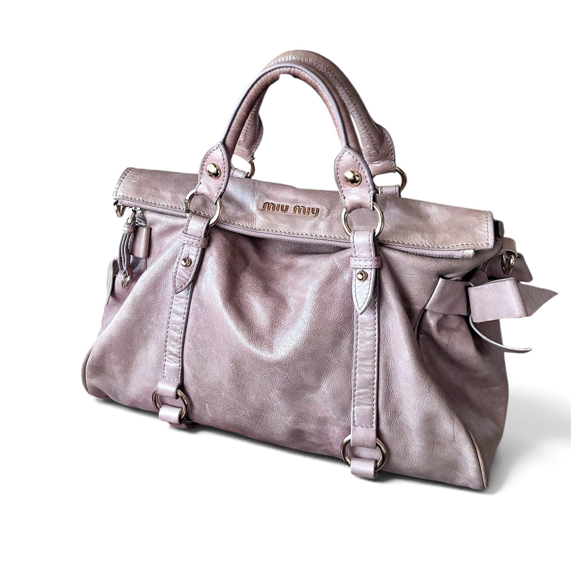 Bow bag leather handbag