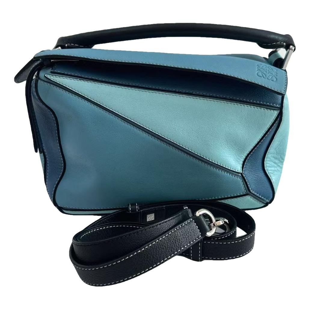 Puzzle leather handbag