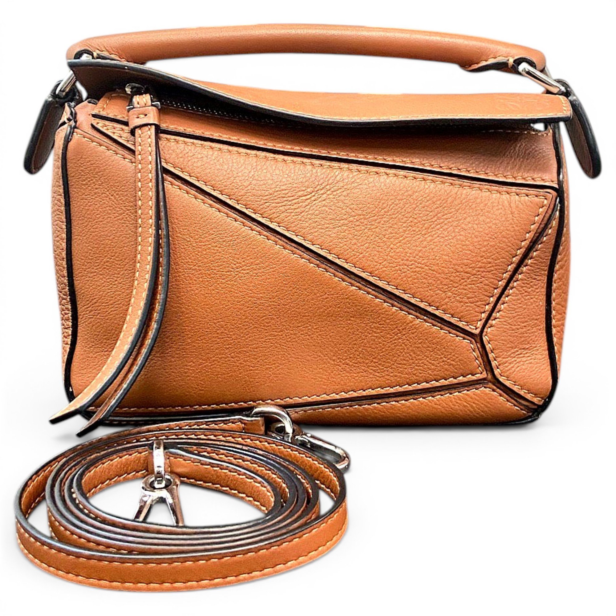 Puzzle leather handbag