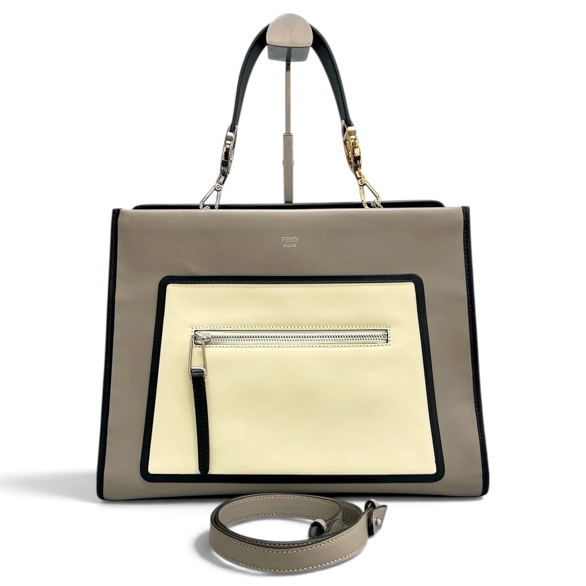 Runaway leather handbag