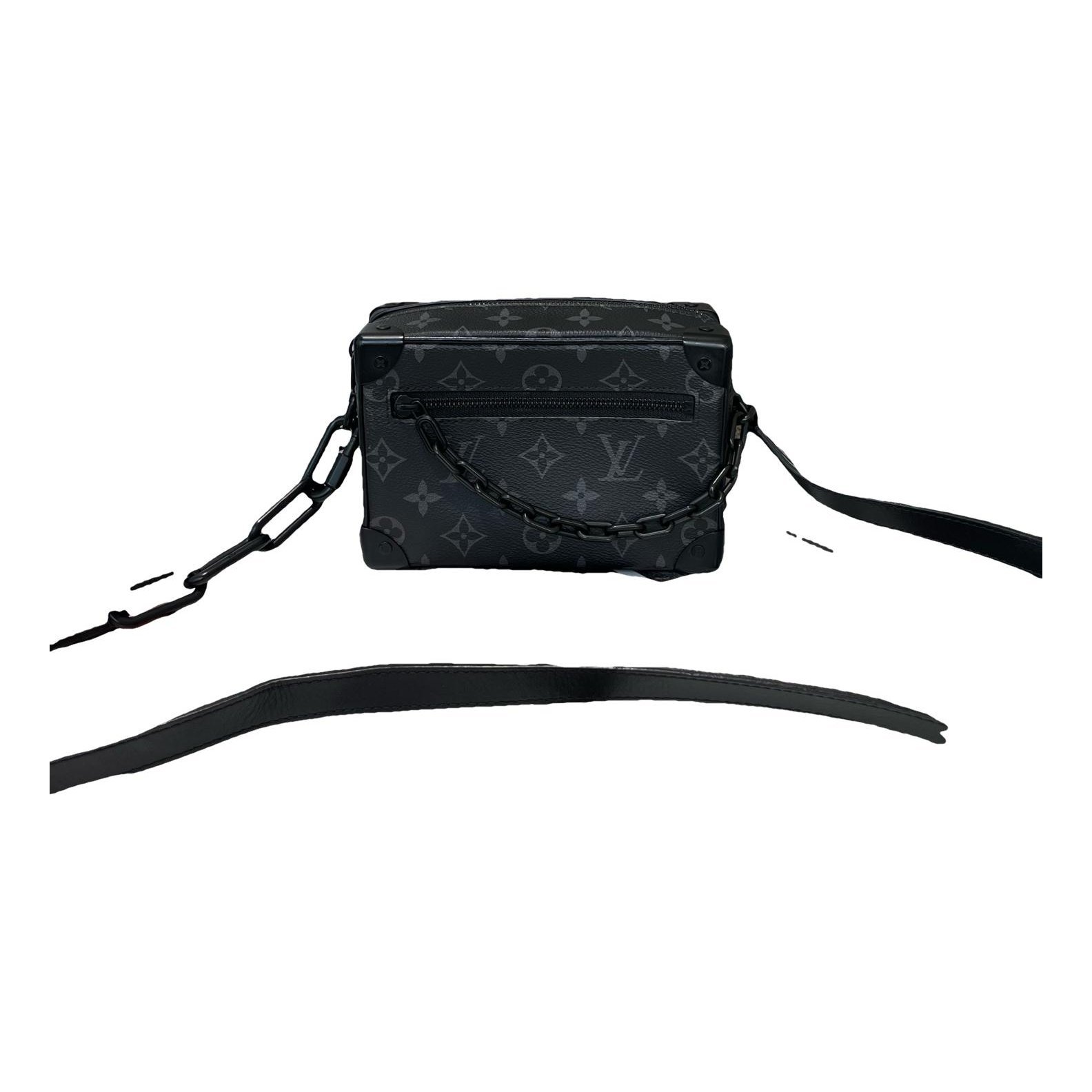 Pochette Trunk leather handbag