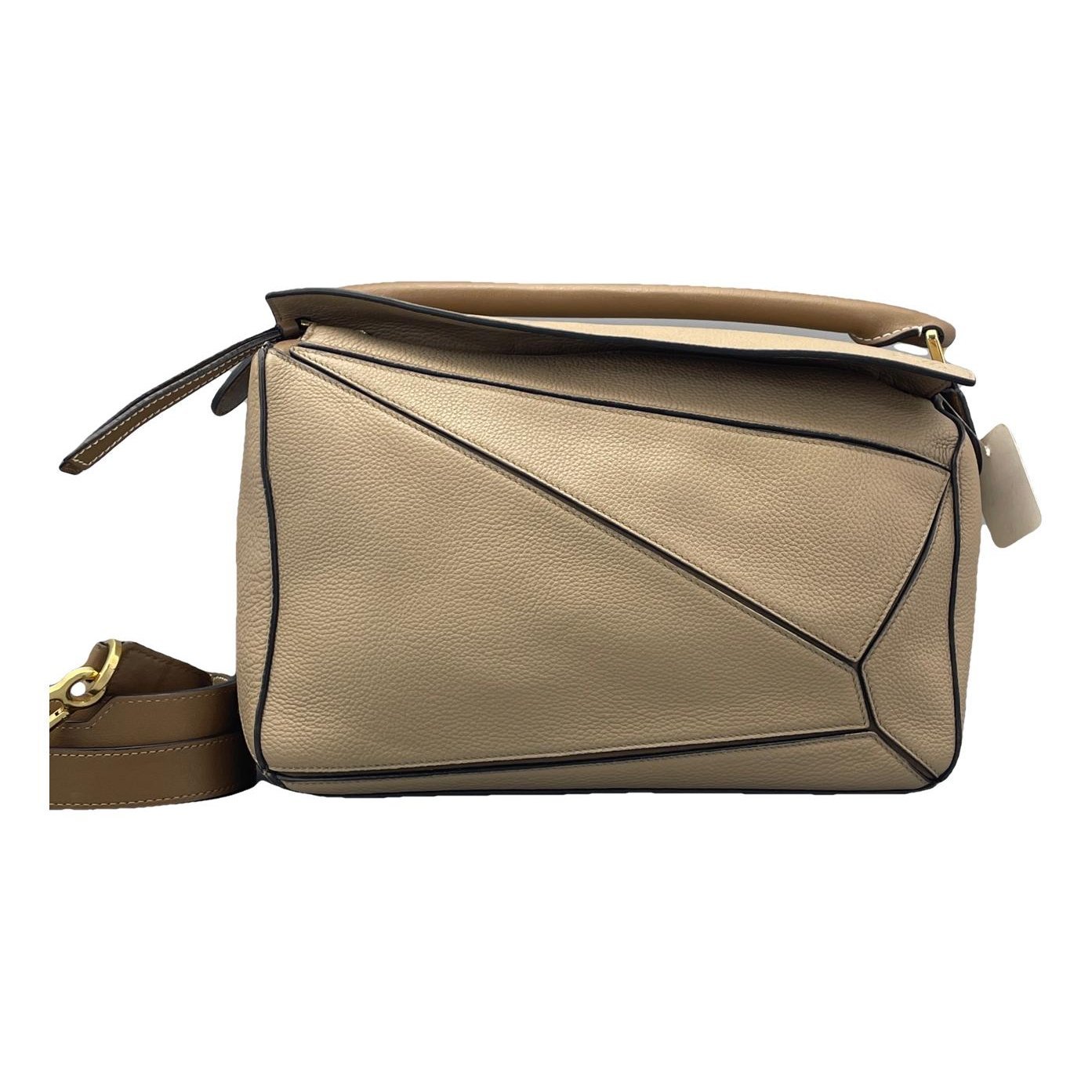 Puzzle leather handbag