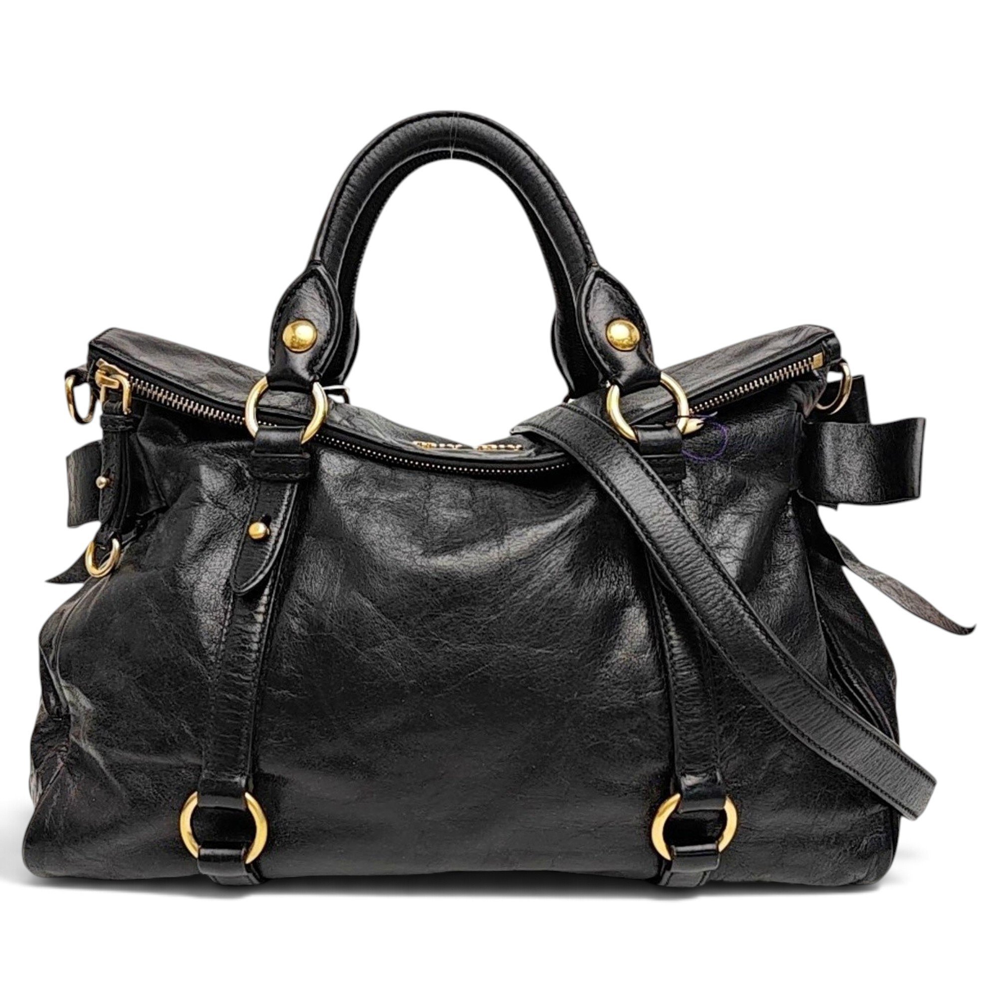 Bow bag leather handbag