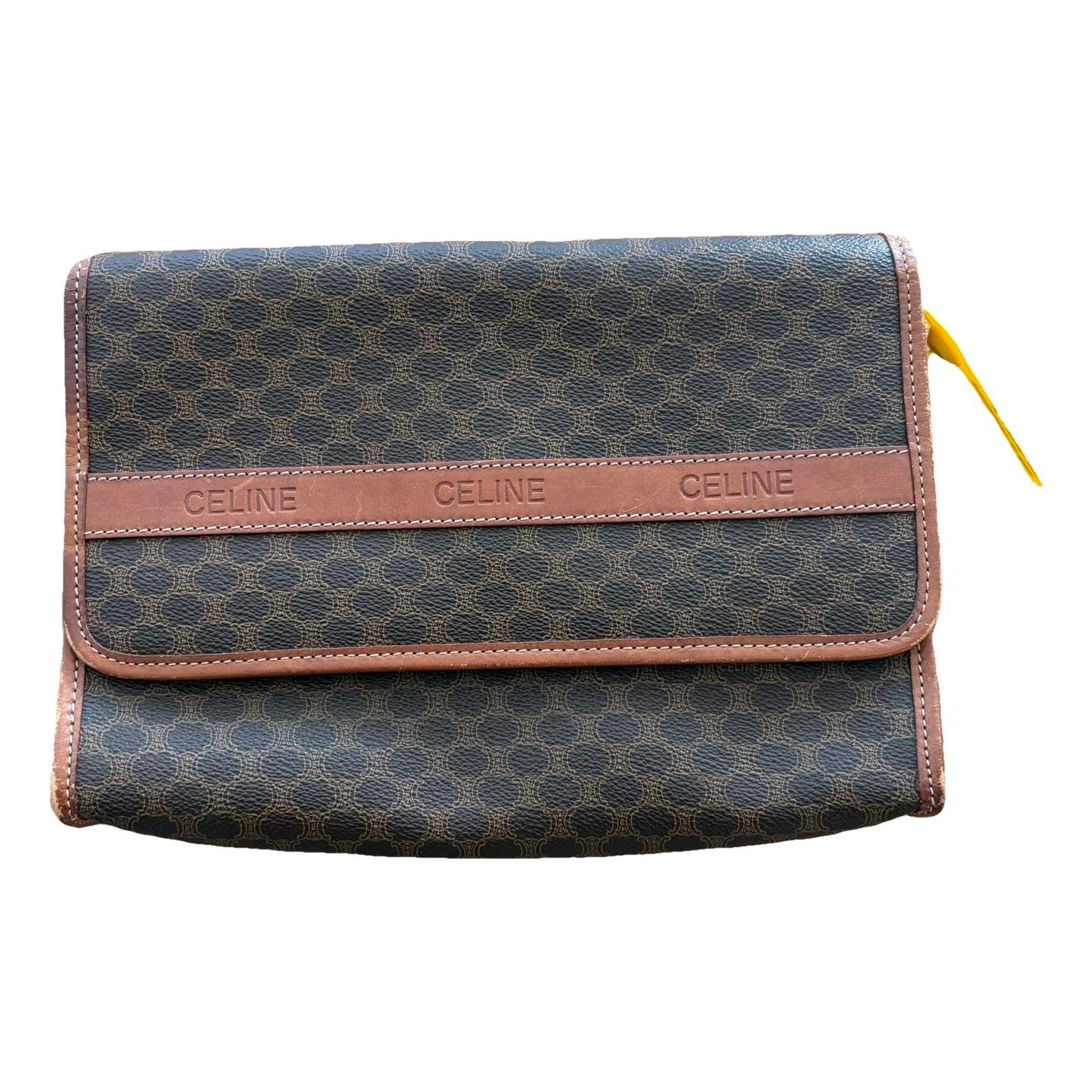 Triomphe Vintage cloth clutch bag