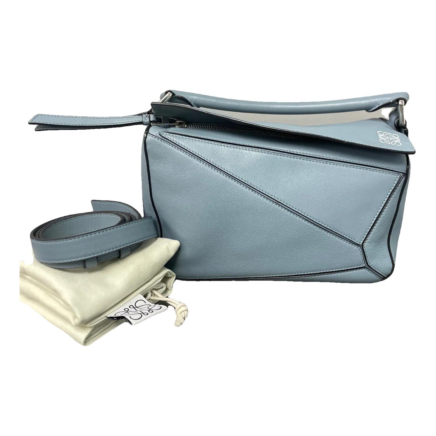 Puzzle leather handbag