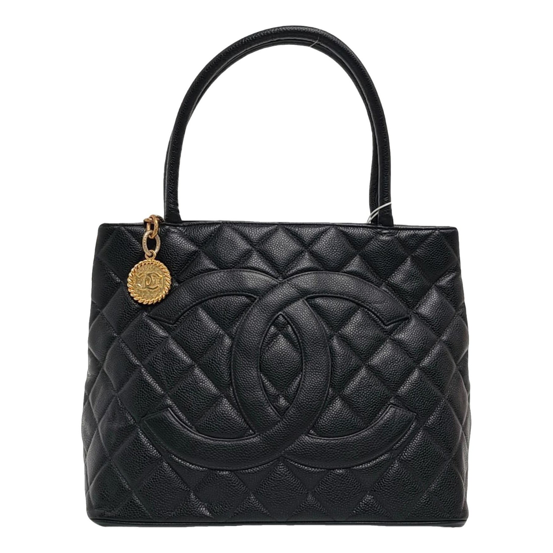 Médaillon leather handbag