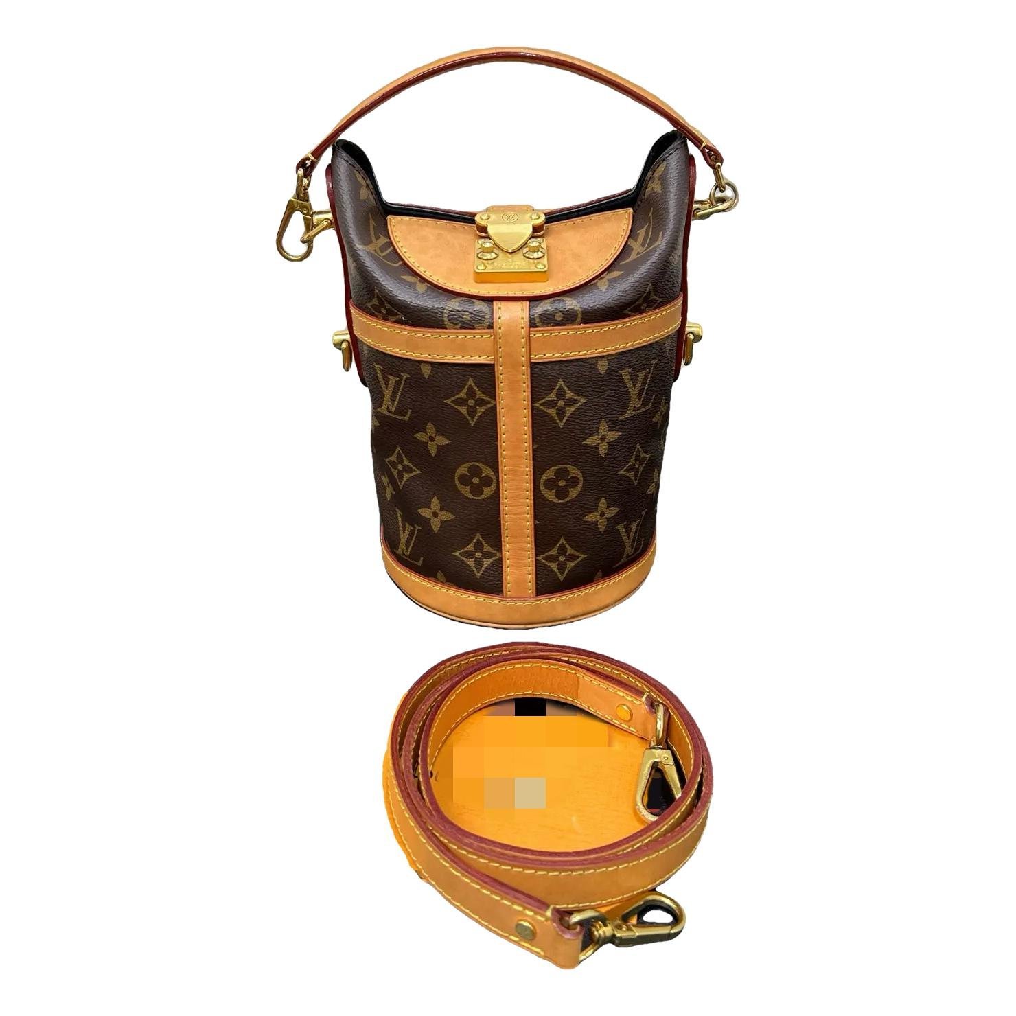 Duffle vinyl handbag