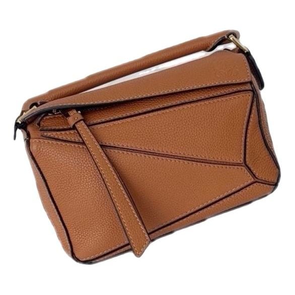 Puzzle leather handbag